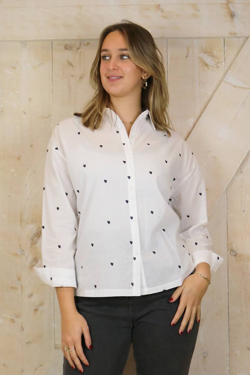 witte blouse